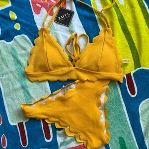 Zaful yellow bikini, size L.
Never worn.